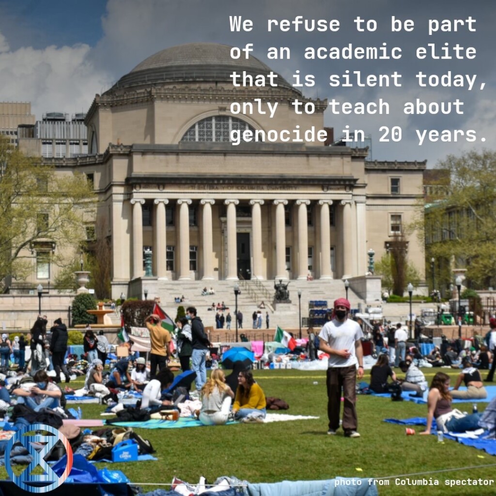 Picture from Colombia Spectator. Many people gathered peacefully on a grassy lawn in front of Colombia University Library, a large stone building with columns, a domed roof and an imposing staircase leading to the entrance. A Palestine flag is visible in one of the groups of people. It is daytime and sunny. The text overlaid on the pictures in this thread is the same as in the posts.