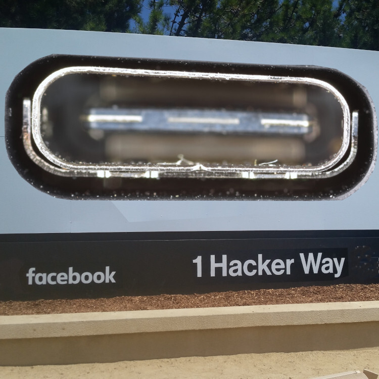 Facebook HQ's iconic '1 Hacker Way' sign. The Facebook logo has been replaced with a giant USB C port.


Image:
D-Kuru (modified)
https://commons.wikimedia.org/wiki/File:MSI_Bravo_17_(0017FK-007)-USB-C_port_large_PNr%C2%B00761.jpg

Minette Lontsie (modified)
https://commons.wikimedia.org/wiki/File:Facebook_Headquarters.jpg

CC BY-SA 4.0
https://creativecommons.org/licenses/by-sa/4.0/deed.en
