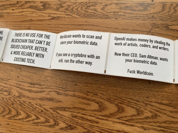 A row of stickers that were printed in a thermal home printer. One says “there is no use for blockchain that can’t be solved cheaper, better, and more reliably with existing tech”. The others have similar messages. 