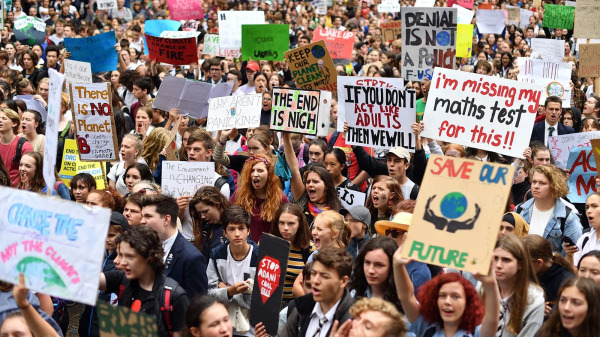 A crowd of students and young people protesting at the climate rally in Australia.