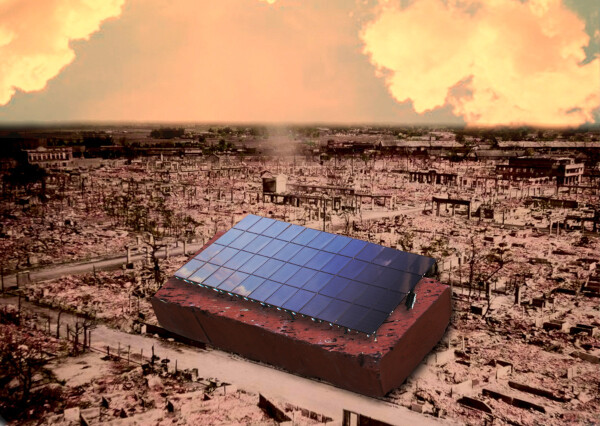 A firebombed cityscape under a smoky red sky. In the foreground is a gigantic brick, most of the length of a city block, with a set of solar panels atop it.

Image:
臺灣古寫真上色 (modified)
https://commons.wikimedia.org/wiki/File:Raid_on_Kagi_City_1945.jpg

Grendelkhan (modified)
https://commons.wikimedia.org/wiki/File:Ground_mounted_solar_panels.gk.jpg

CC BY-SA 4.0
https://creativecommons.org/licenses/by-sa/4.0/deed.en
