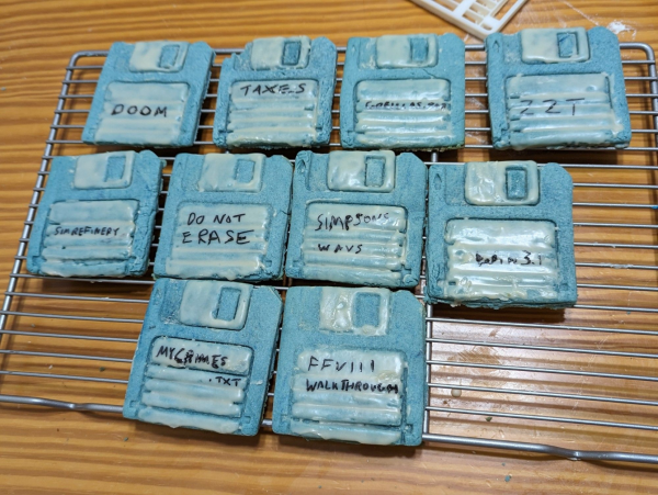 Floppy disk cookies with various joke labels, including Doom, SimRefinery, and MyCrimes.txt.